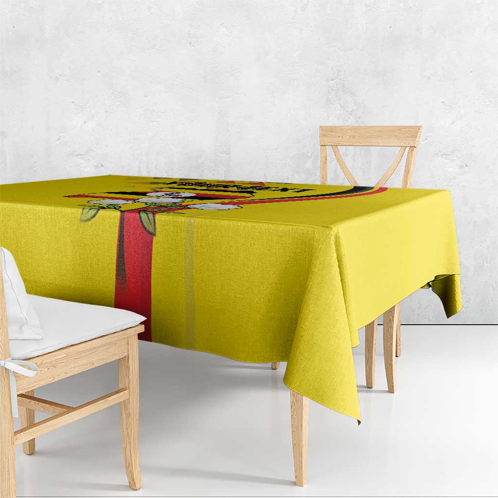 Yellow tablecloth with red stripe and crane bird crown graphic