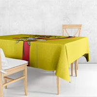 Yellow tablecloth with red stripe and crane bird crown graphic