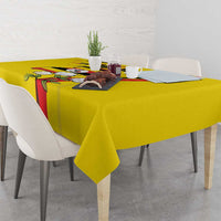 Yellow tablecloth with red stripe and crowned crane bird print