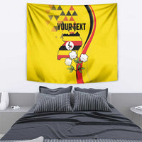 Yellow wall tapestry showing Uganda map, flower bouquet, and 'YOUR TEXT' header