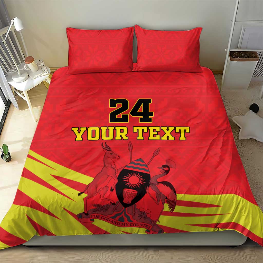 Red duvet with “24 YOUR TEXT” center graphic, kente-style yellow stripes, and Coat of Arms