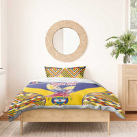 Personalized duvet with blue, yellow condor artwork and matching geometric pillow shams