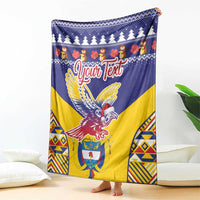 Personalized Christmas blanket, blue and yellow condor crest with trees and flower band