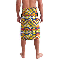 Blue-and-yellow knee-length swim shorts with colorful geometric tribal pattern on back