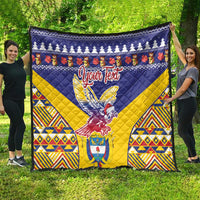 Personalized blue and yellow quilt featuring a condor emblem, “Your Text,” and patterned borders.