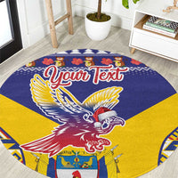 Round blue and yellow personalized carpet with condor graphic and 'Your Text' center