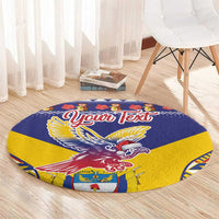 Round blue and yellow personalized carpet with condor graphic and 'Your Text' title