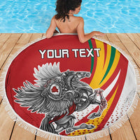 Red round beach blanket with fringe, “YOUR TEXT” and Lithuanian crest graphic, draped