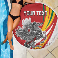 Red round beach blanket with fringe, “YOUR TEXT” and Lithuanian crest graphic, poolside