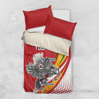 Red and white bedding set, folded view of duvet with “YOUR TEXT” crest graphic