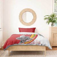Red and white bedding set on a wooden bed frame with “YOUR TEXT” crest graphic