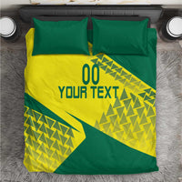 Green and yellow duvet bedding set with geometric triangle graphic and two pillowcases