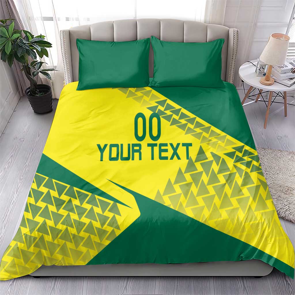 Yellow and green duvet bedding set with geometric triangle graphic and “YOUR TEXT”