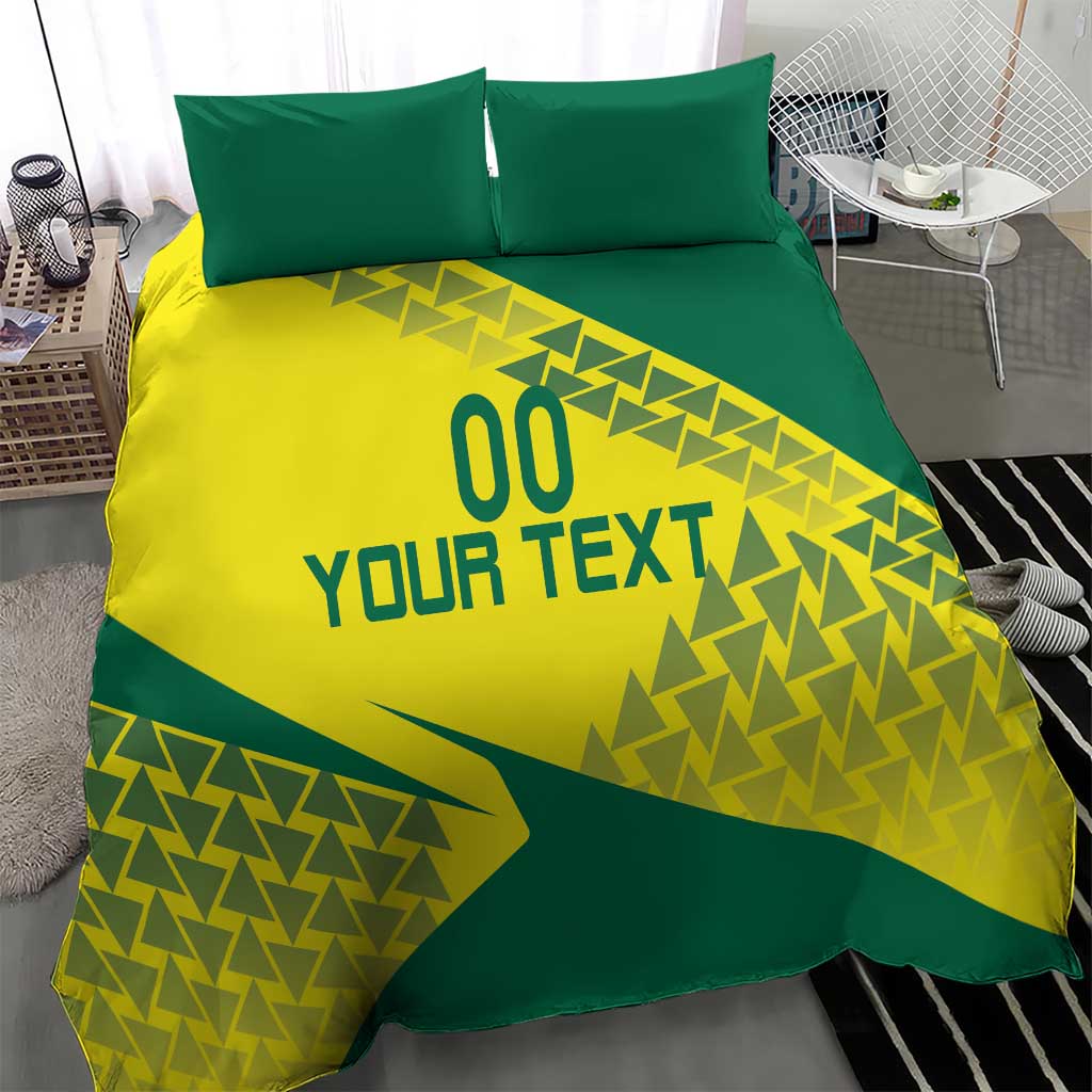 Green and yellow bedding set with geometric triangle pattern and two matching pillowcases