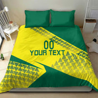 Green and yellow duvet bedding set with geometric triangle pattern and two pillowcases