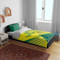 Green and yellow bedding set with geometric triangle graphic on duvet and pillowcases