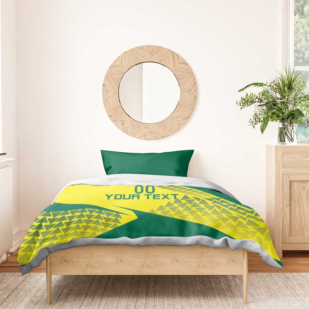 Yellow and green duvet bedding set with geometric triangle graphic and two pillowcases