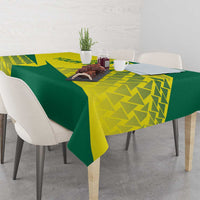 Green and yellow tablecloth with volleyball-style geometric print and pointed accents