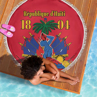 Red round Haiti beach blanket with fringed edge, lady and flag graphic with '18 04' text