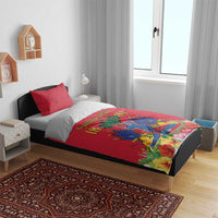 Red duvet cover with Haiti Independence artwork, styled with two red pillow shams
