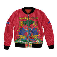 Red bomber jacket with black ribbed collar, full-zip front, Haiti graphic panel.