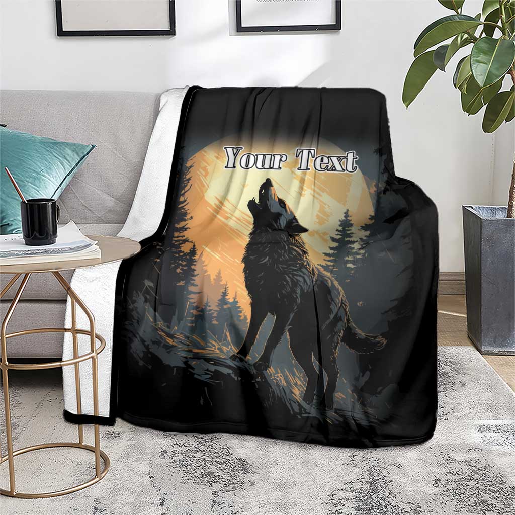 Black blanket on living room couch with howling wolf and 'Your Text' personalized design