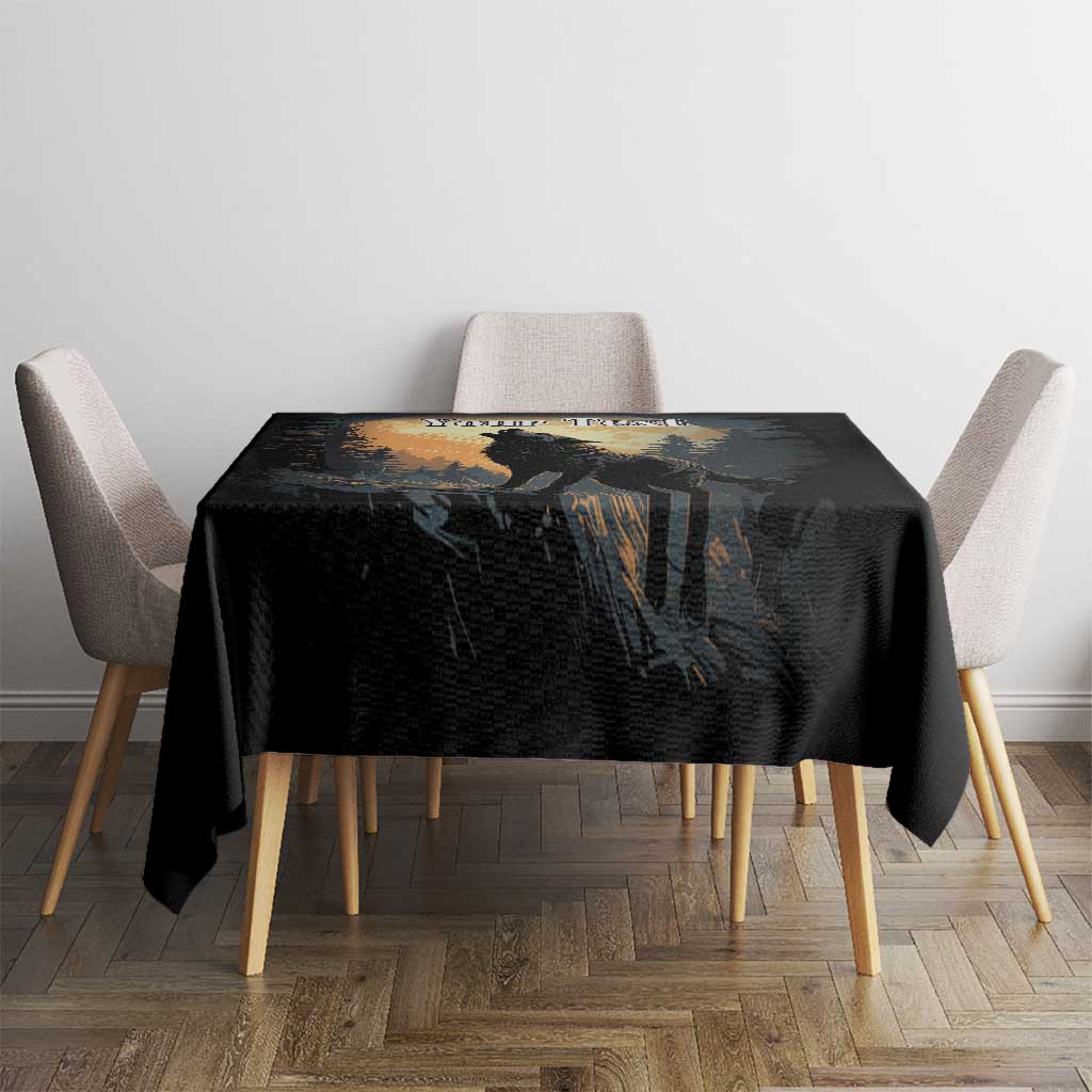 Black tablecloth with wolf howling at the moon artwork on dining table