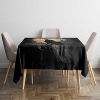 Black tablecloth with wolf howling at the moon artwork on dining table