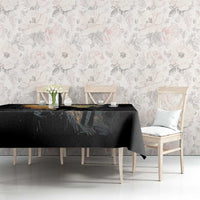 Black wolf howling at the moon tablecloth covering dining table