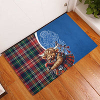 Blue tartan rubber doormat featuring Highland cow playing bagpipes, angled view
