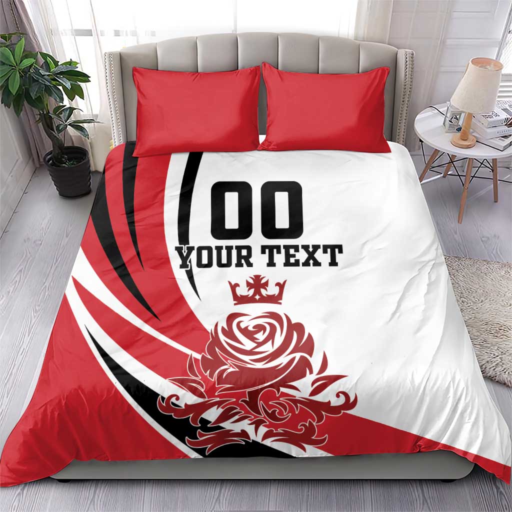 Red and white duvet cover set with black text and crest graphic, with two red pillow shams