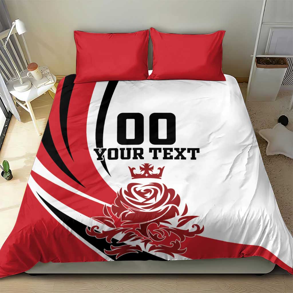 Red and white duvet cover with black '00 YOUR TEXT' and rose-crest graphic, two red pillows
