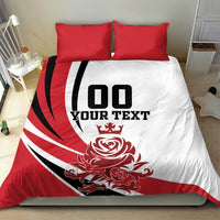 Red and white duvet cover with black '00 YOUR TEXT' and rose-crest graphic, two red pillows