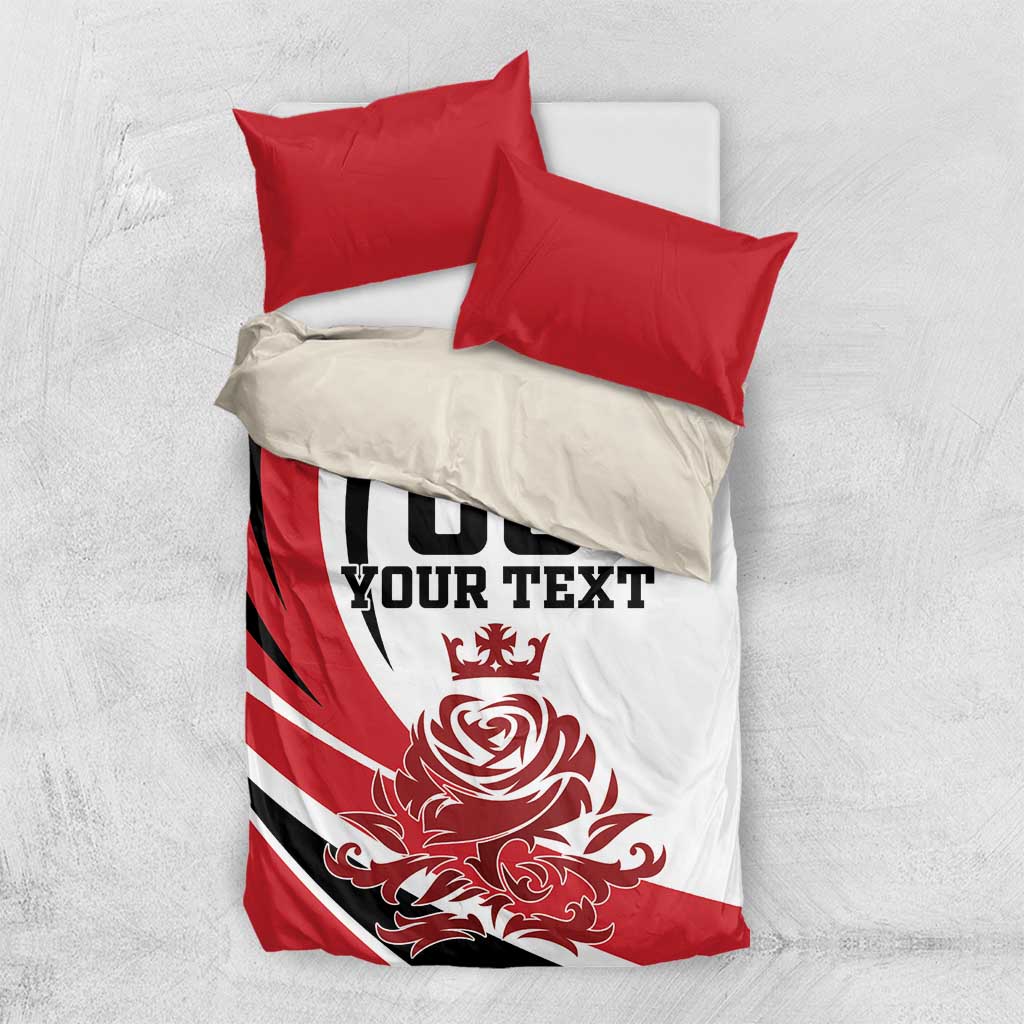 Red and white duvet cover with black '00 YOUR TEXT' crest and rose graphic, two red pillows
