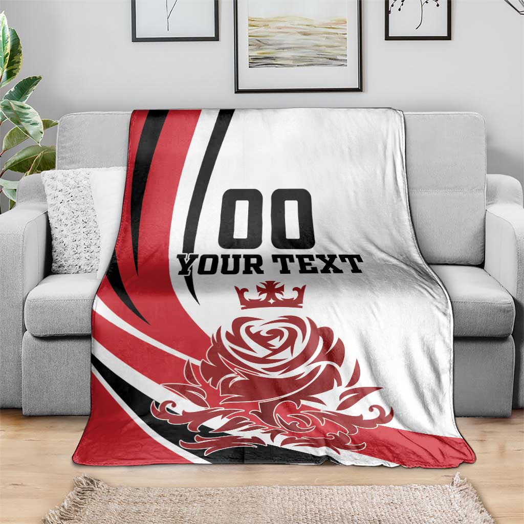 Custom England football blanket draped on a sofa with 00 YOUR TEXT and red rose graphic