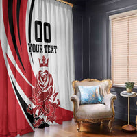 Decorative red, white, and black window curtain with crest and “YOUR TEXT” design