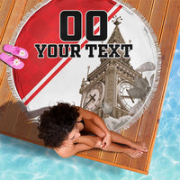 Round beach blanket with fringe, Big Ben print and 'YOUR TEXT' on red check center.