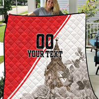 Red and white quilt draped, diamond quilting, Big Ben print, and 'YOUR TEXT'.