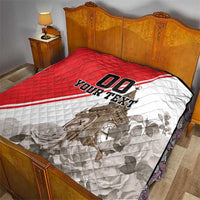 Red and white quilt on bed, quilted diamonds, Big Ben scene, and 'YOUR TEXT'.