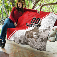 Red and white quilt laid out, diamond quilting, Big Ben graphic with 'YOUR TEXT'.