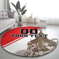 Round area rug with red-and-white design, 'YOUR TEXT' and Big Ben with roses