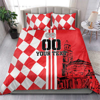 Red and white checkerboard bedding set with two pillows and bold skyline print on duvet