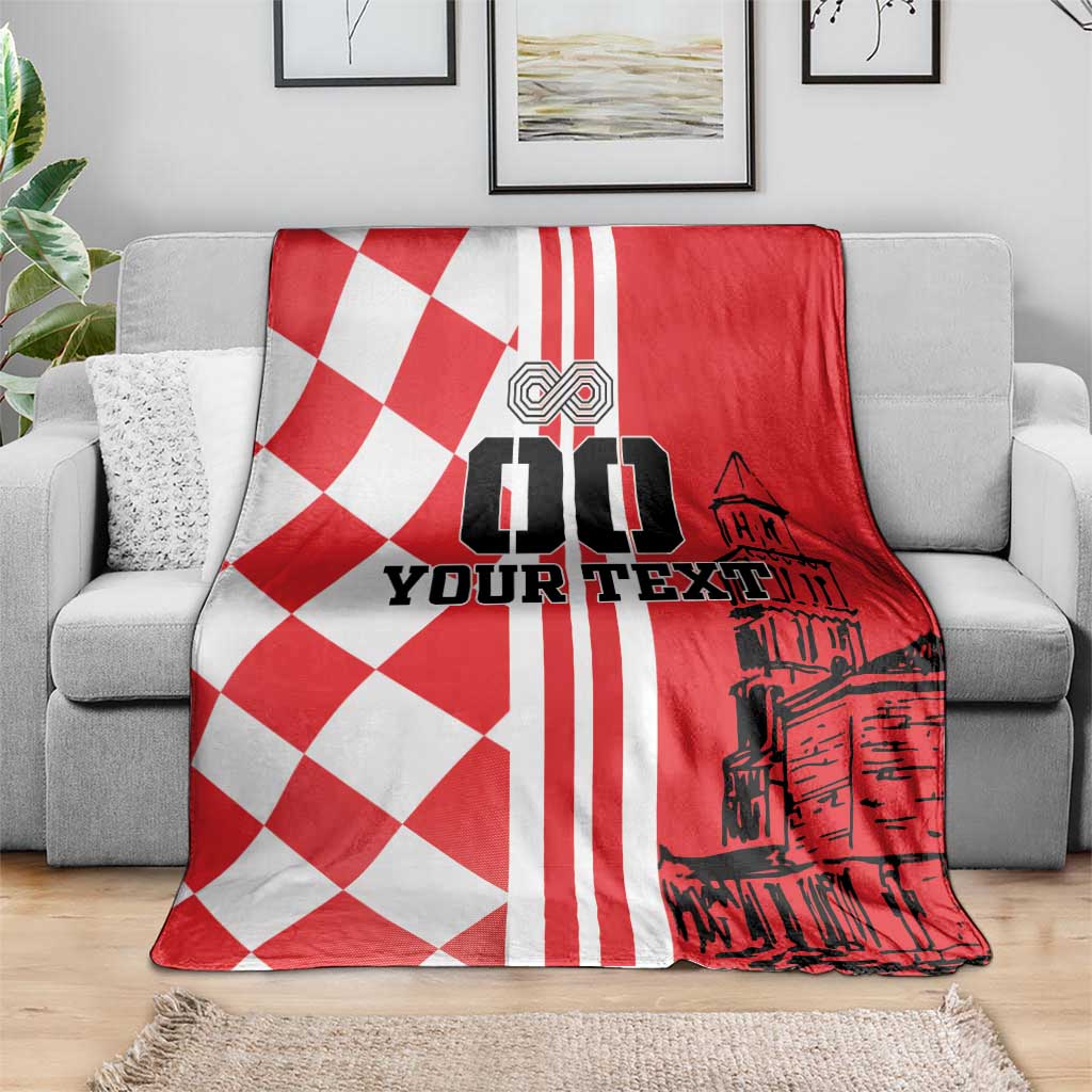 Red and white blanket with checkerboard pattern, 'YOUR TEXT', and cathedral graphic