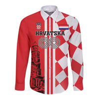 Red and white long sleeve button shirt with checker pattern, stripes, and graphic crest