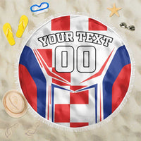 Round beach blanket with fringe lying flat, custom text and red, white, blue flag print