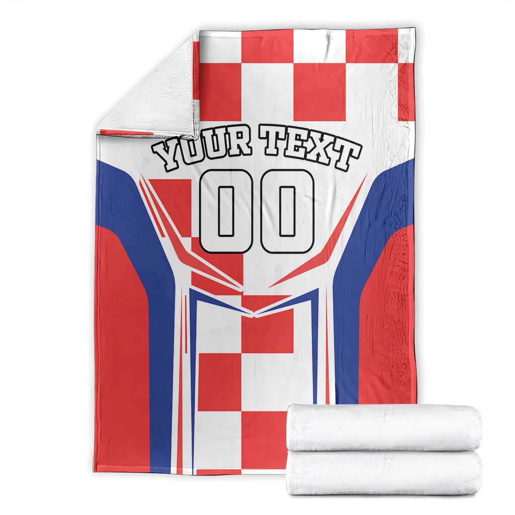 Folded red, white, and blue checkerboard blanket with 'YOUR TEXT' and large '00' design
