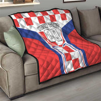 Quilt throw with red, white, and blue patchwork graphic and “YOUR TEXT 00” center