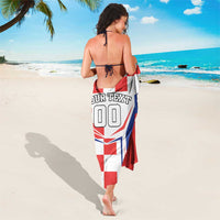 Croatia checkerboard sarong with red, white, and blue flag print, tied at the waist