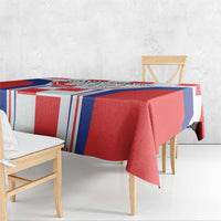 Red, white, and blue tablecloth with smooth top and folded hanging edge