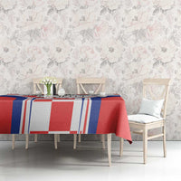 Red, white, and blue tablecloth on table with striped center pattern